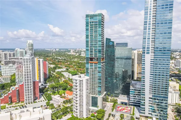 a view of city with tall buildings