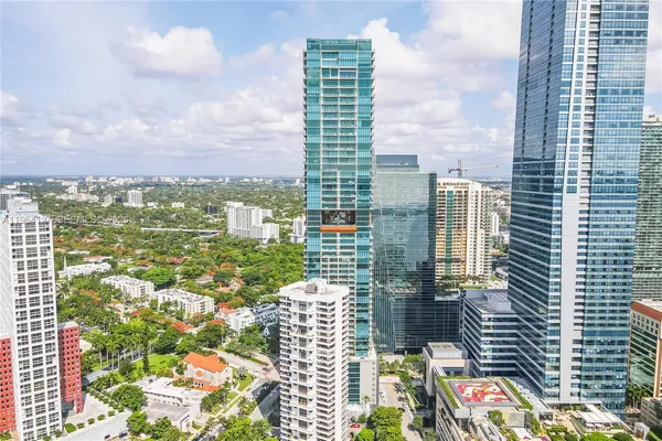 a view of city with tall buildings