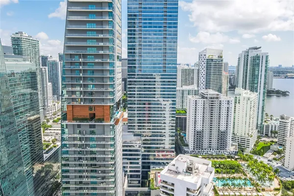a view of a city with tall buildings