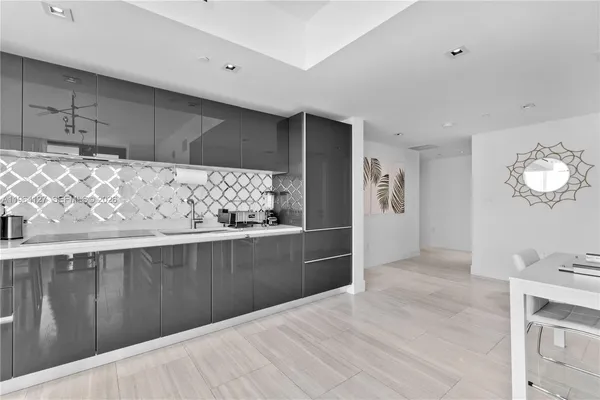 a view of kitchen with wooden floor