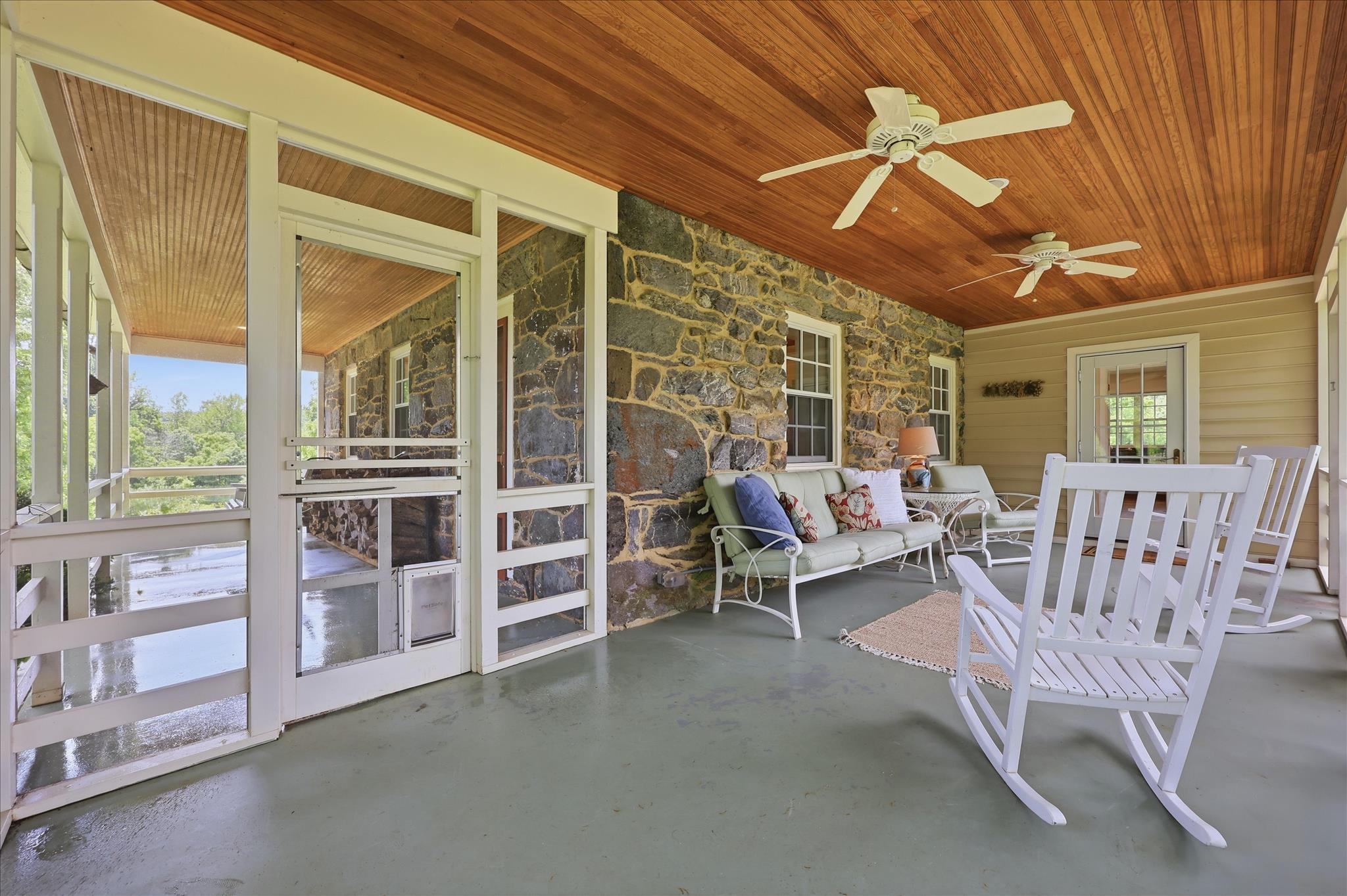 10919 Etzler Mill Road Woodsboro, MD 21798 - Photo 32 of 54 a view of a patio with a table and chairs