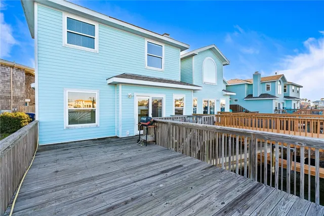 a view of a pathway with a wooden fence