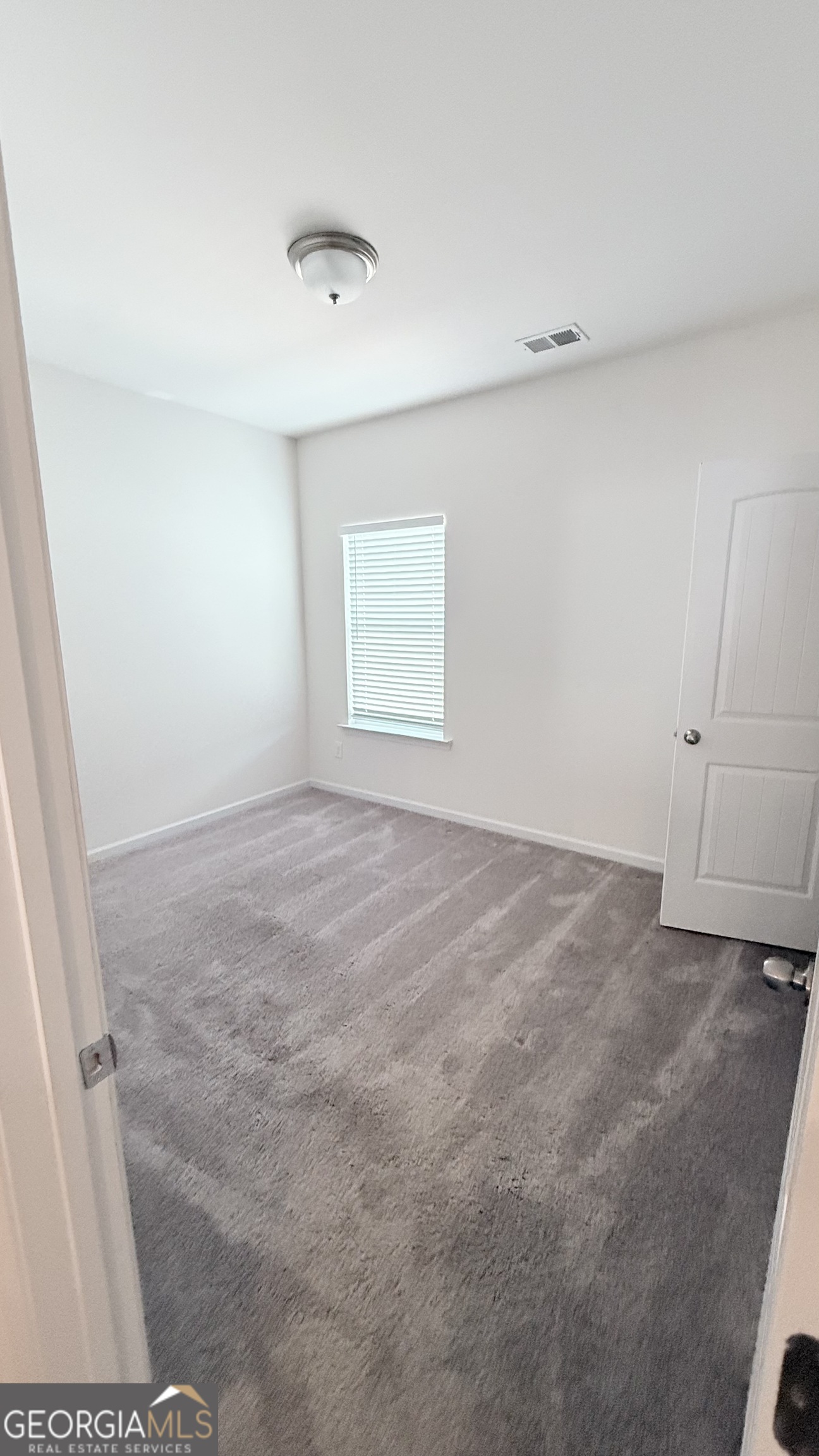 63 Thacker Trail Adairsville, GA 30103 - Photo 14 of 21 an empty room with windows