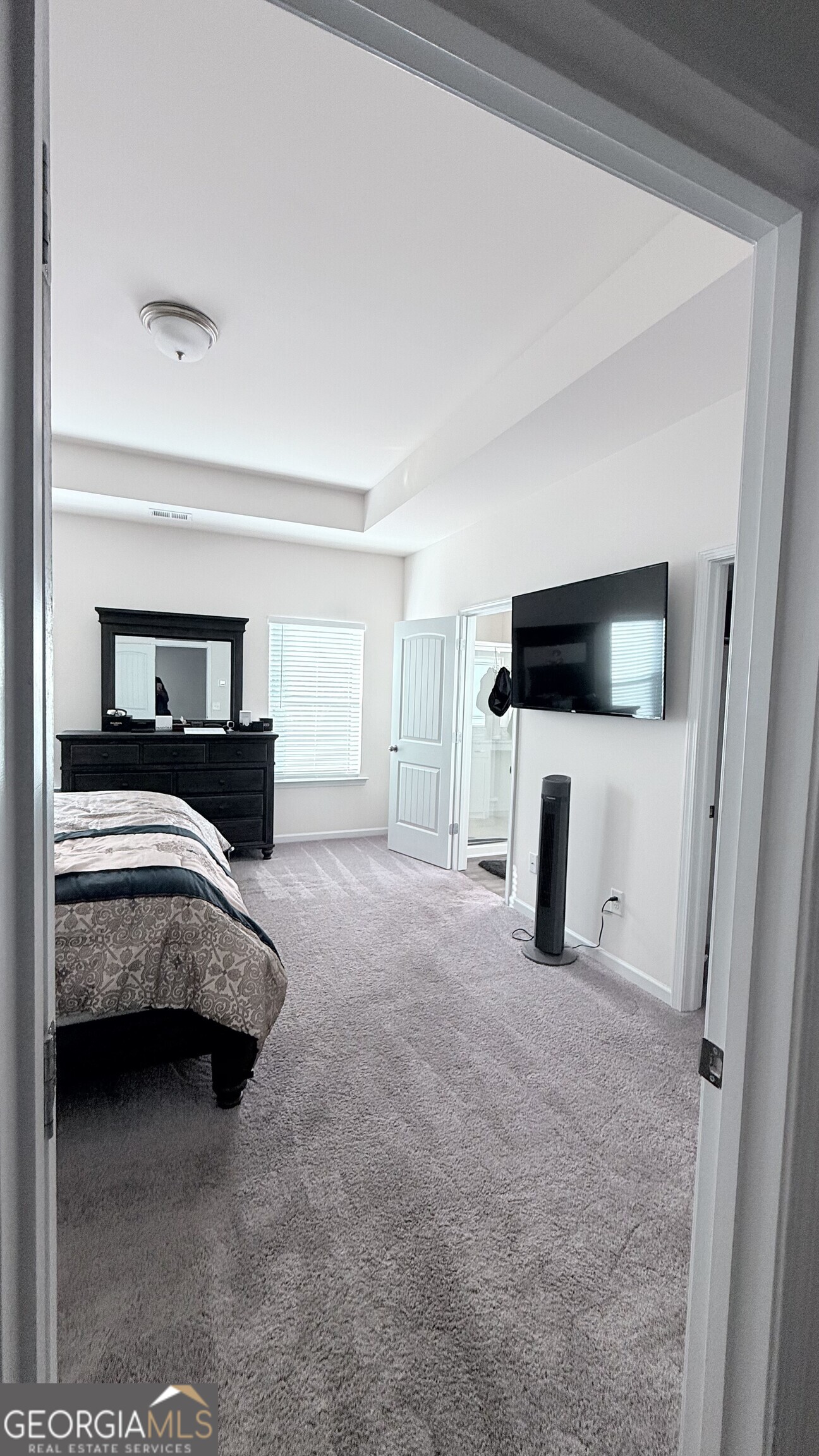 63 Thacker Trail Adairsville, GA 30103 - Photo 9 of 21 a view of a livingroom with furniture and a flat screen tv