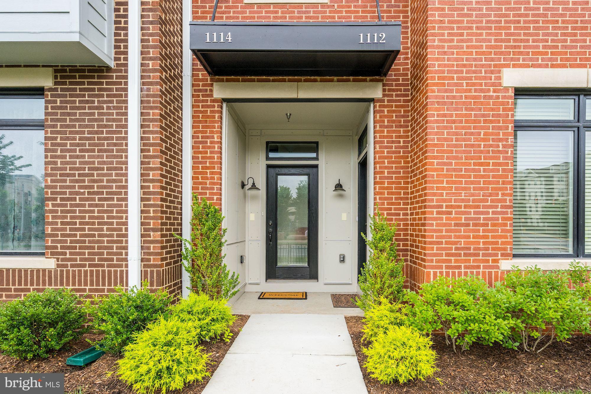 1114 Ribbon Limestone Terrace Southeast Leesburg, VA 20175 - Photo 2 of 24 Welcome to your piece of downtown living!