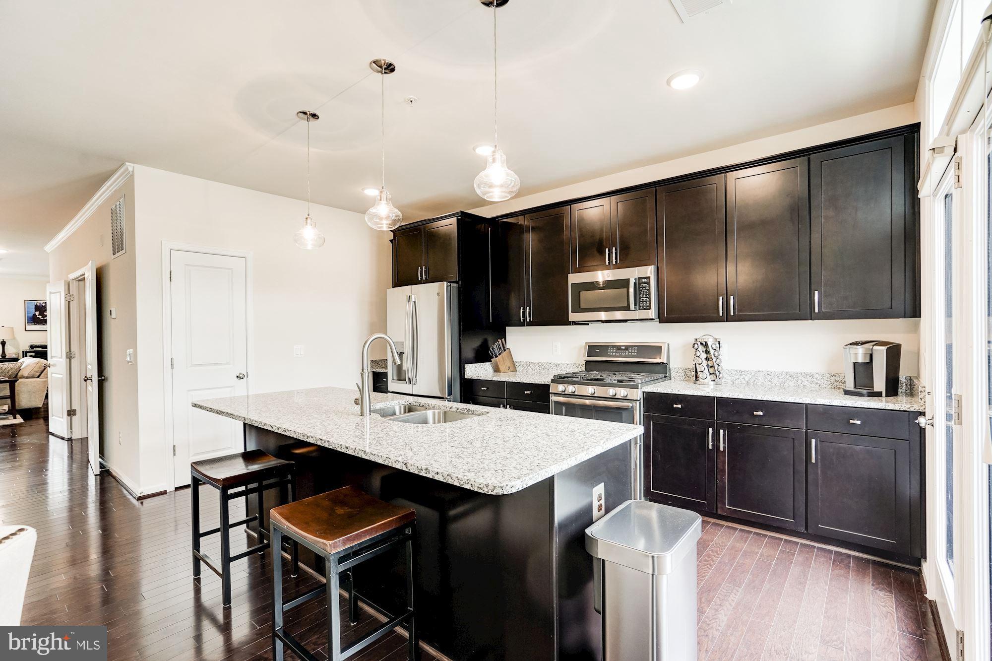 1114 Ribbon Limestone Terrace Southeast Leesburg, VA 20175 - Photo 11 of 24 Another view of the kitchen.