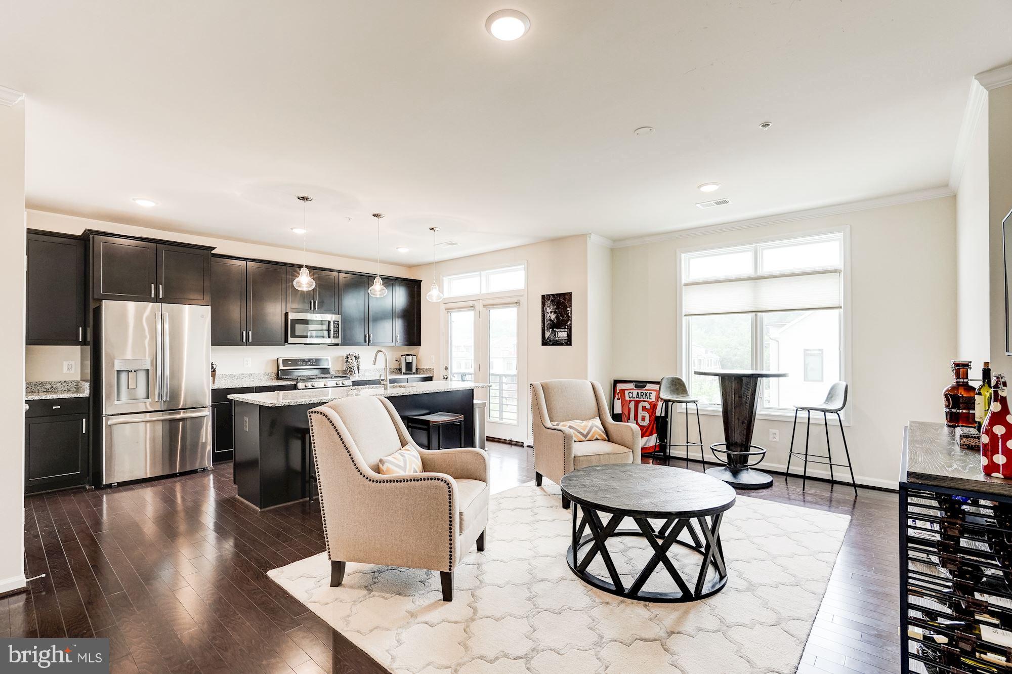 1114 Ribbon Limestone Terrace Southeast Leesburg, VA 20175 - Photo 7 of 24 Plenty of seating off the kitchen area.
