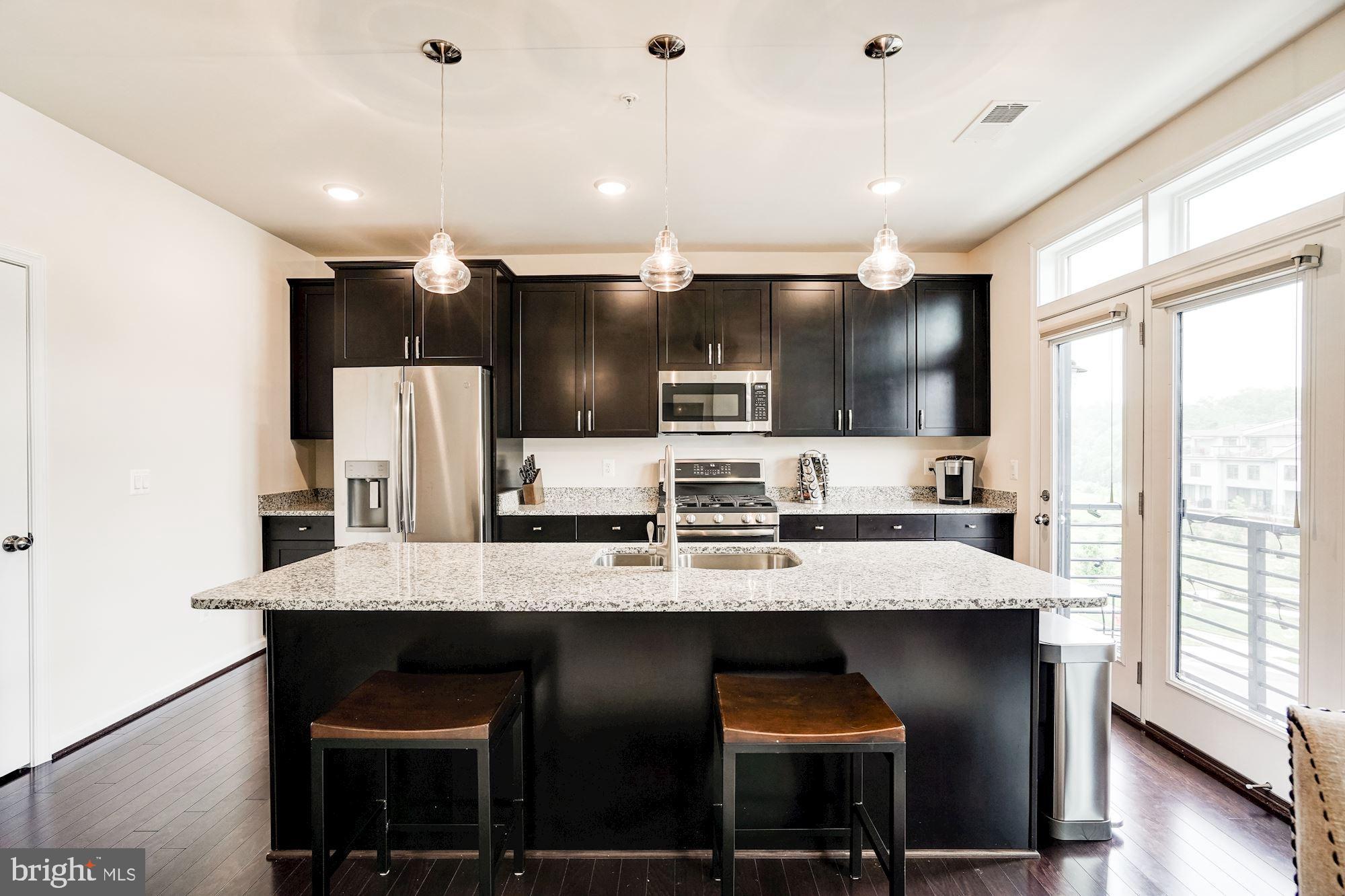 1114 Ribbon Limestone Terrace Southeast Leesburg, VA 20175 - Photo 10 of 24 Full size center island for prep.