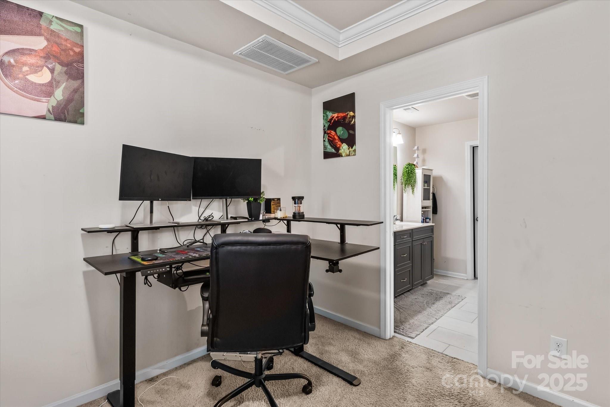 1564 Galloway Road Charlotte, NC 28262 - Photo 13 of 22 a view of a livingroom with furniture and a flat screen tv