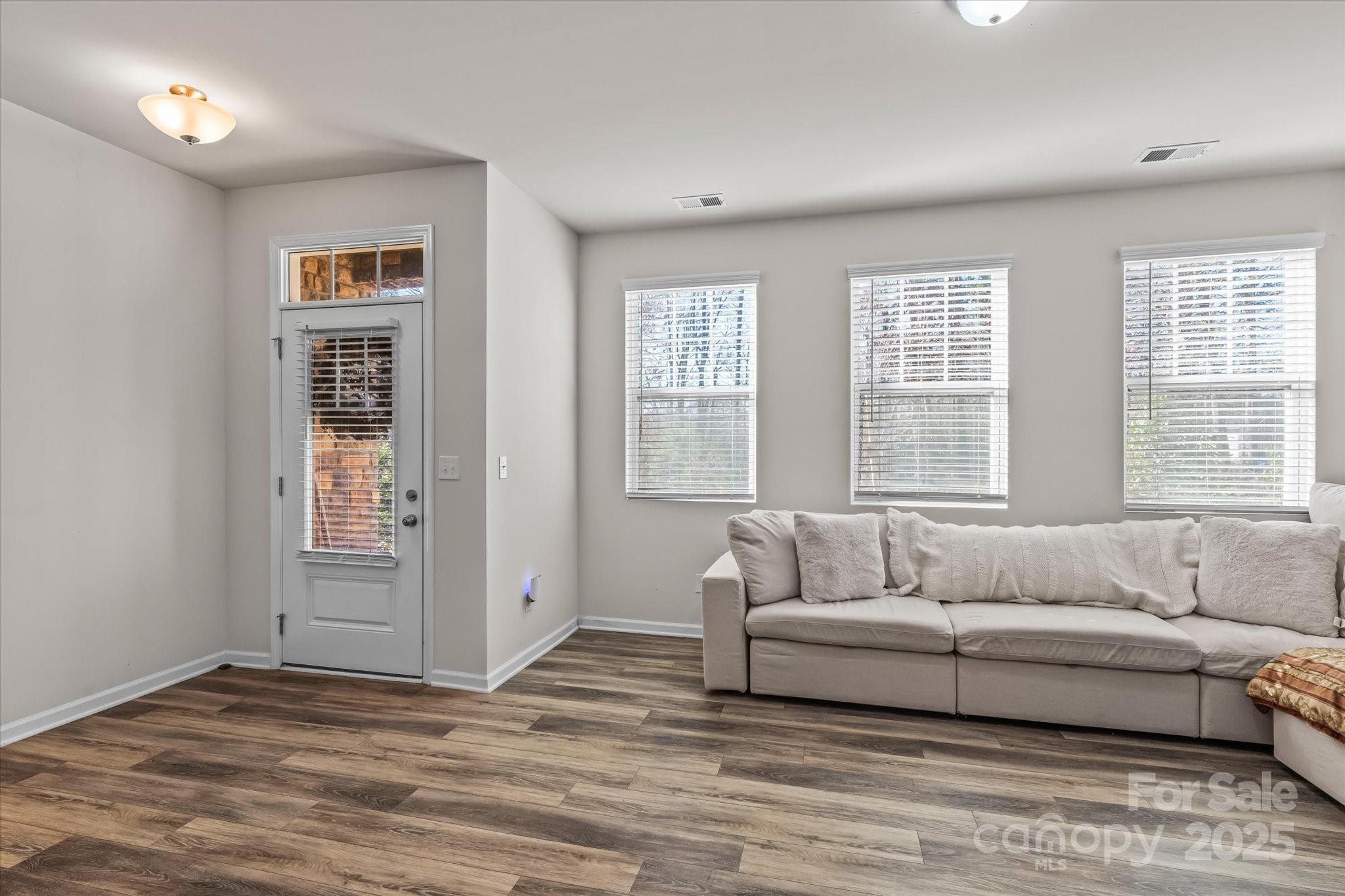1564 Galloway Road Charlotte, NC 28262 - Photo 4 of 22 a living room with furniture and windows