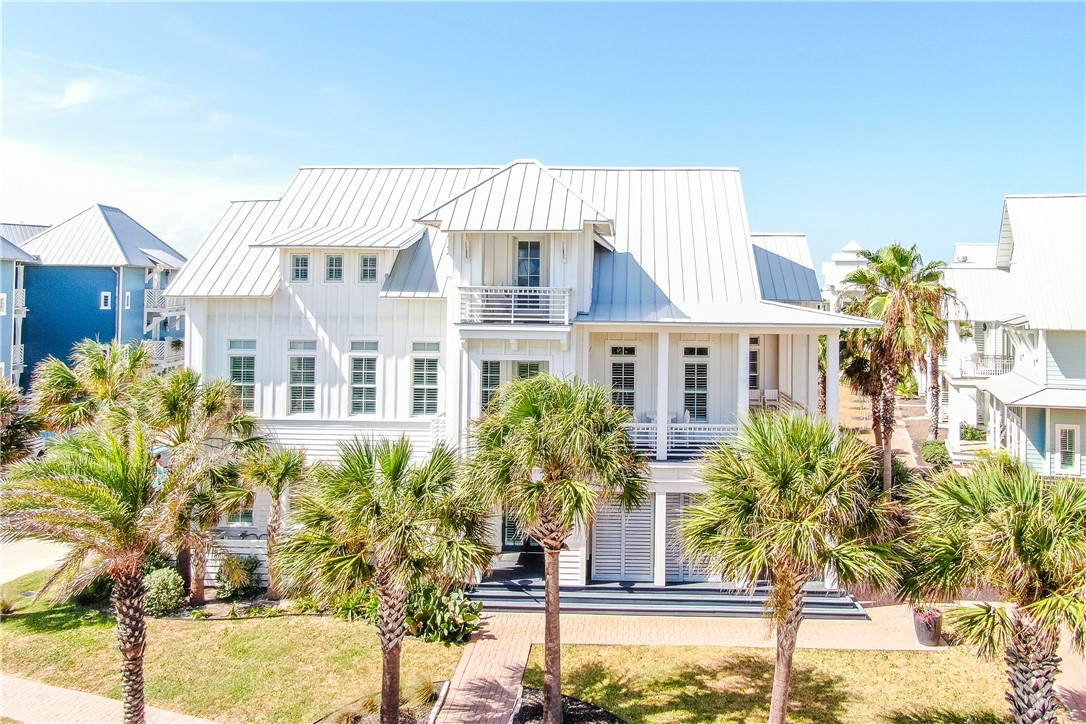 a view of a house with a street