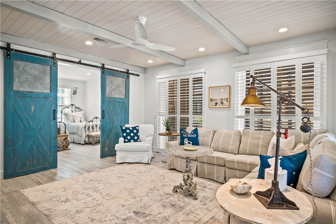 200 Round Road Port Aransas, TX 78373 - Photo 9 of 31 a living room with furniture and a large window