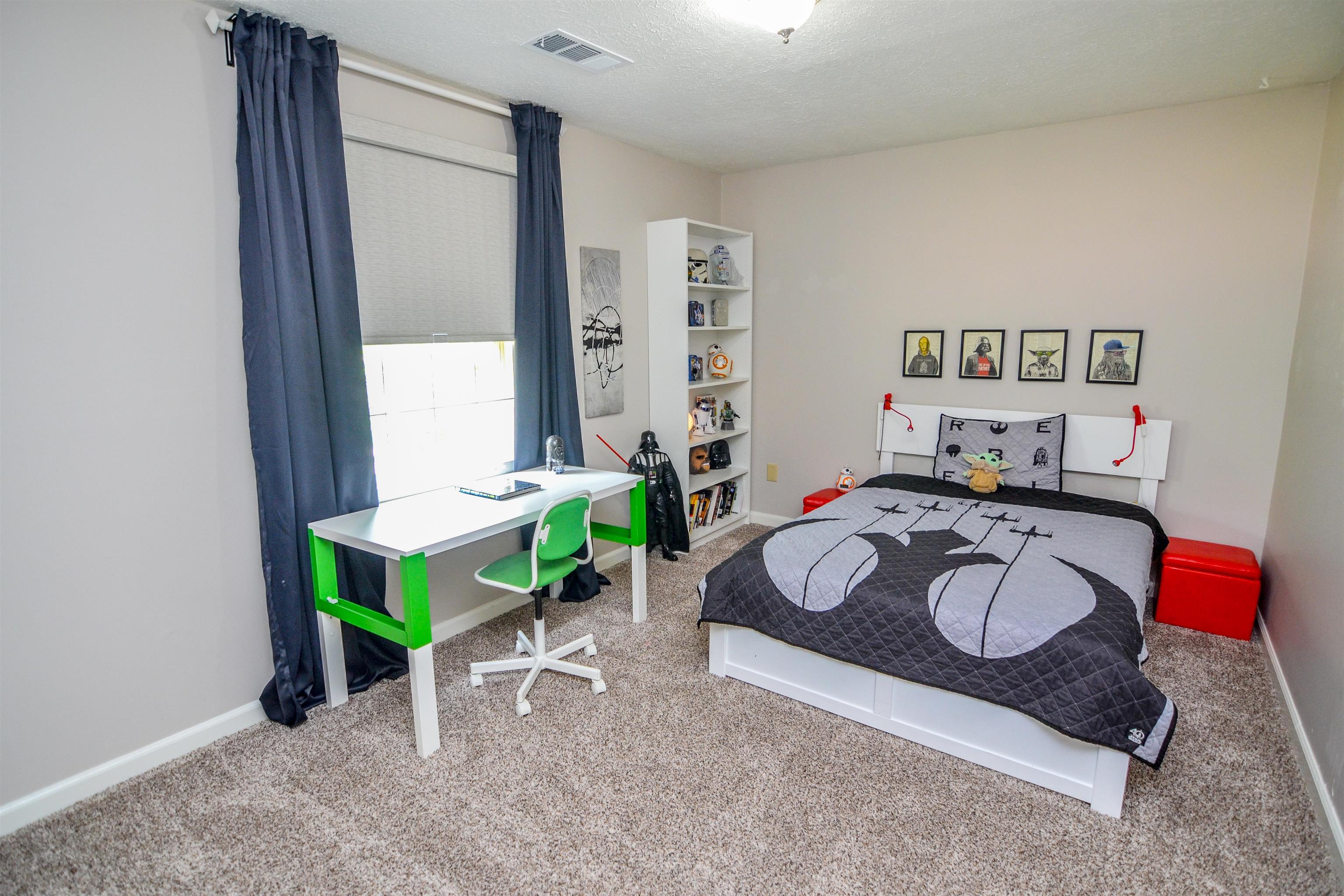 218 East Harpers Ferry Road Collierville, TN 38017 - Photo 19 of 25 a bedroom with bed and a window