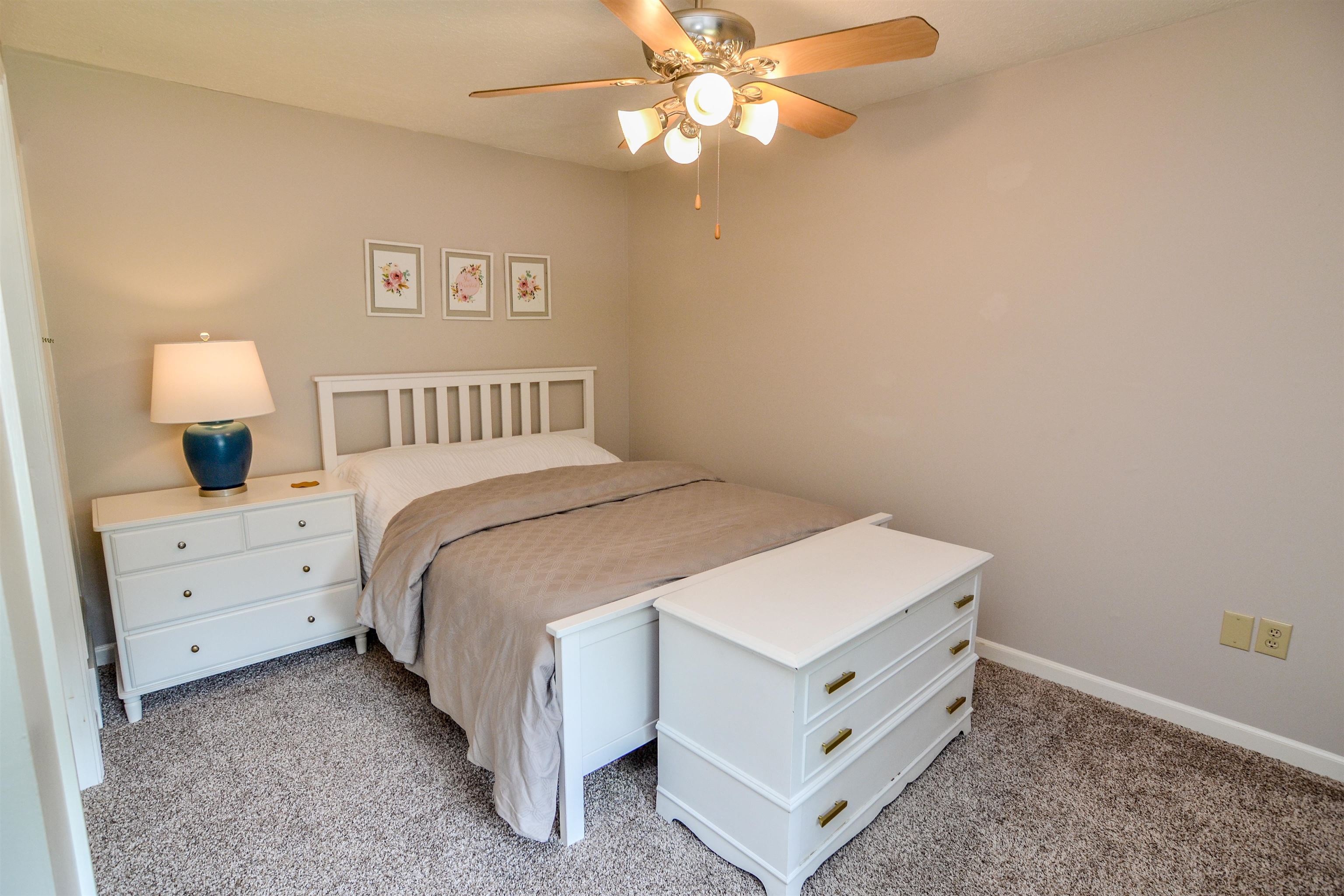 218 East Harpers Ferry Road Collierville, TN 38017 - Photo 21 of 25 a bed room with a bed and a window