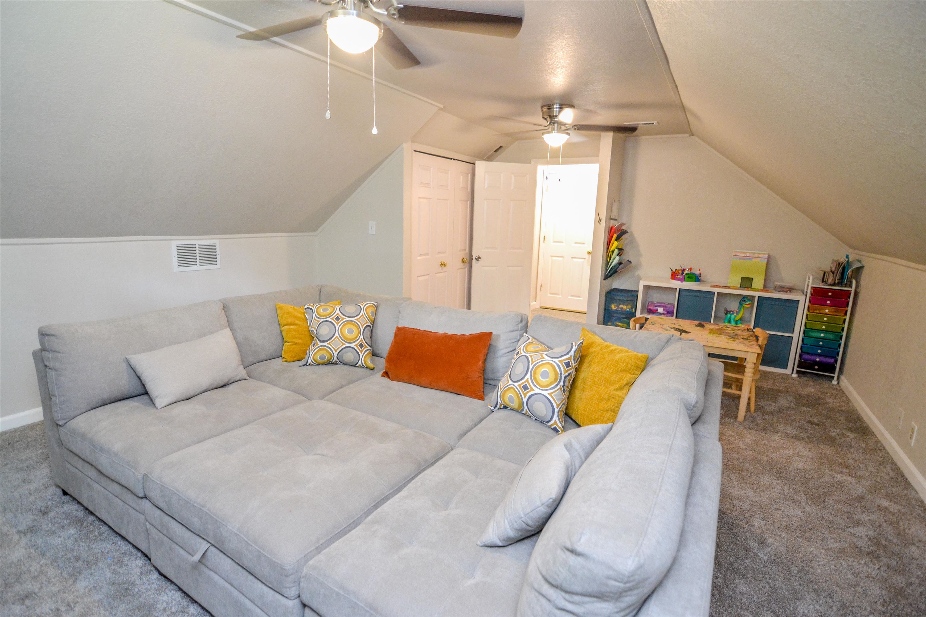 218 East Harpers Ferry Road Collierville, TN 38017 - Photo 23 of 25 a living room with furniture and a chandelier