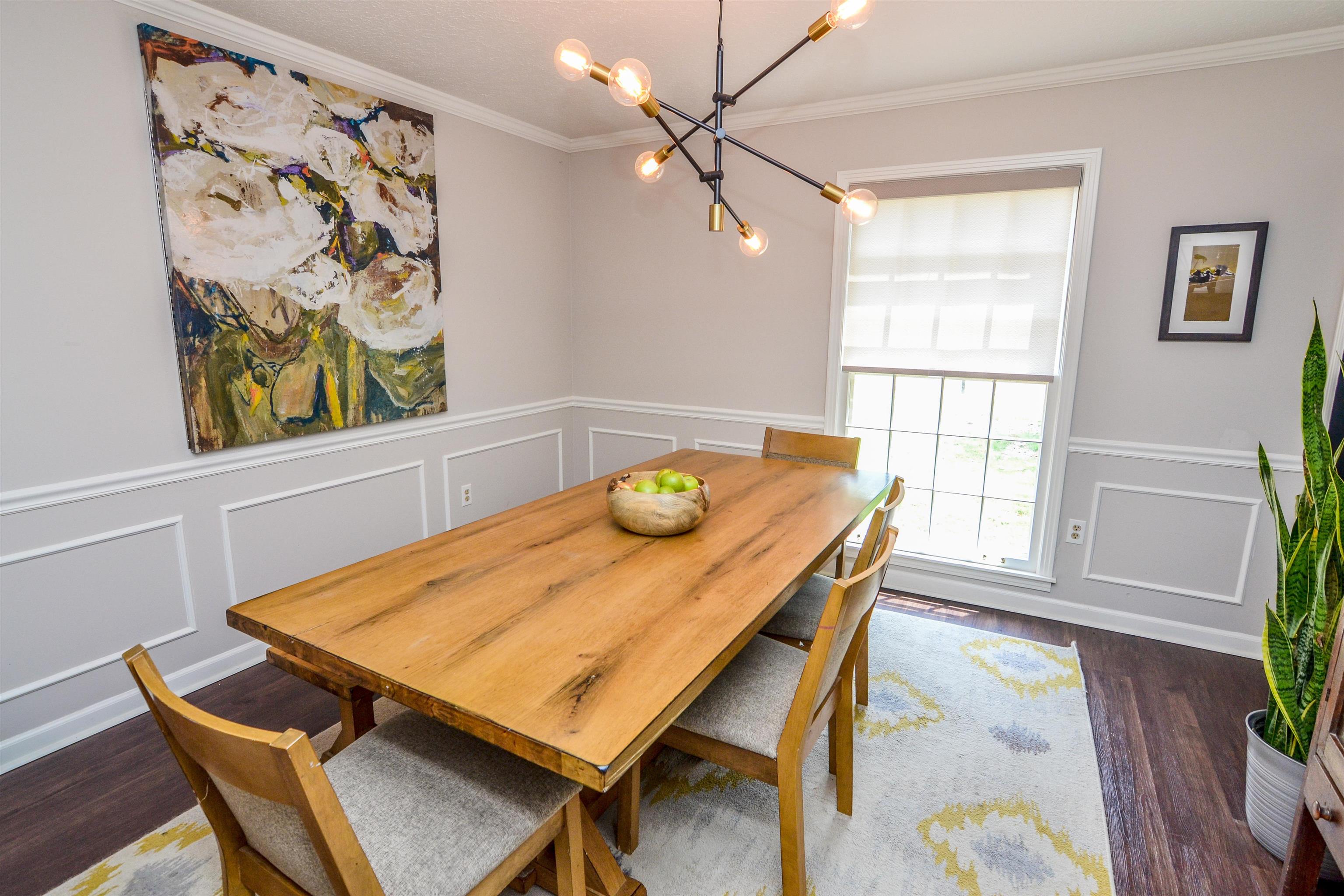 218 East Harpers Ferry Road Collierville, TN 38017 - Photo 4 of 25 a view of a dining table and chairs in a room