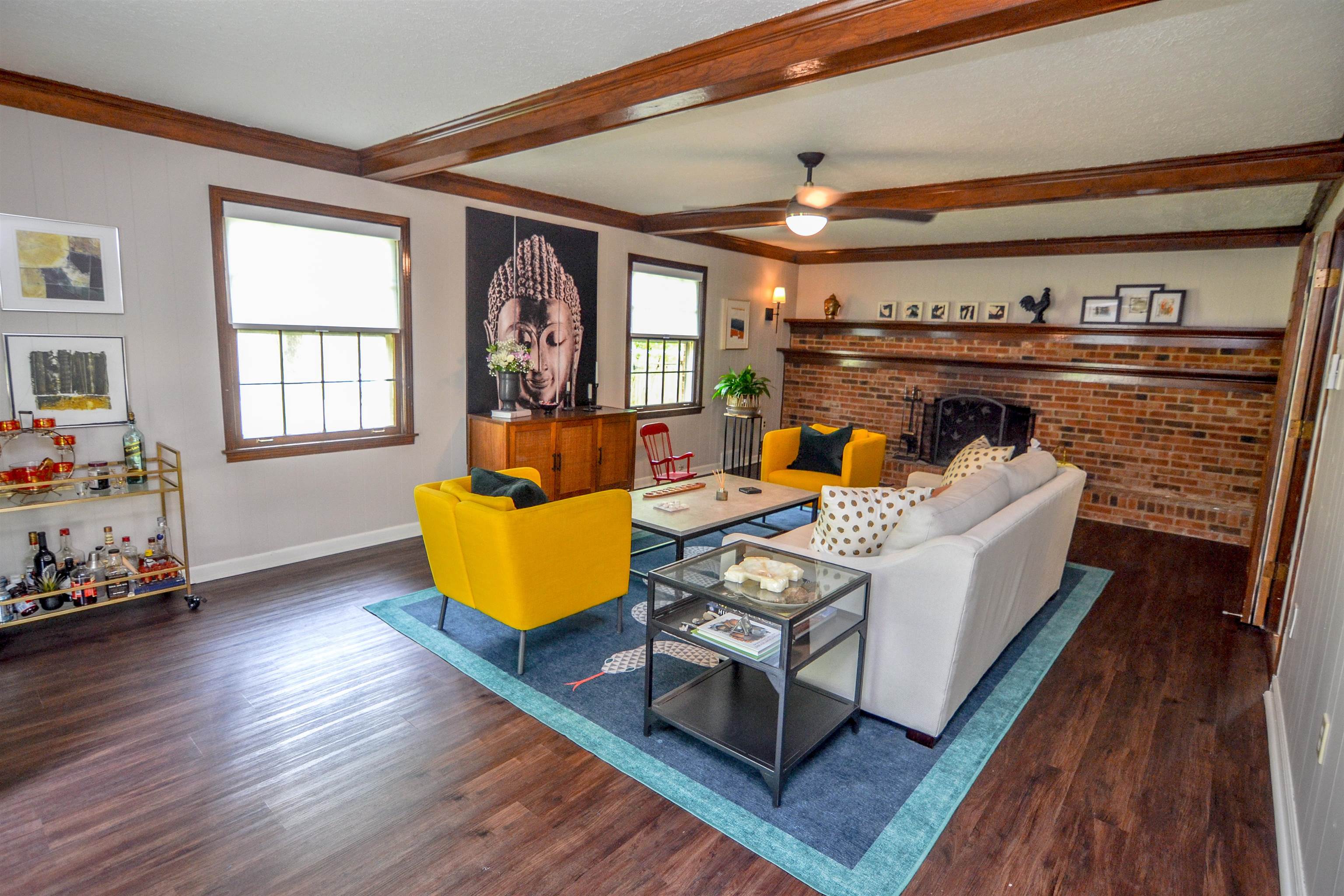 218 East Harpers Ferry Road Collierville, TN 38017 - Photo 5 of 25 a living room with furniture and a fireplace