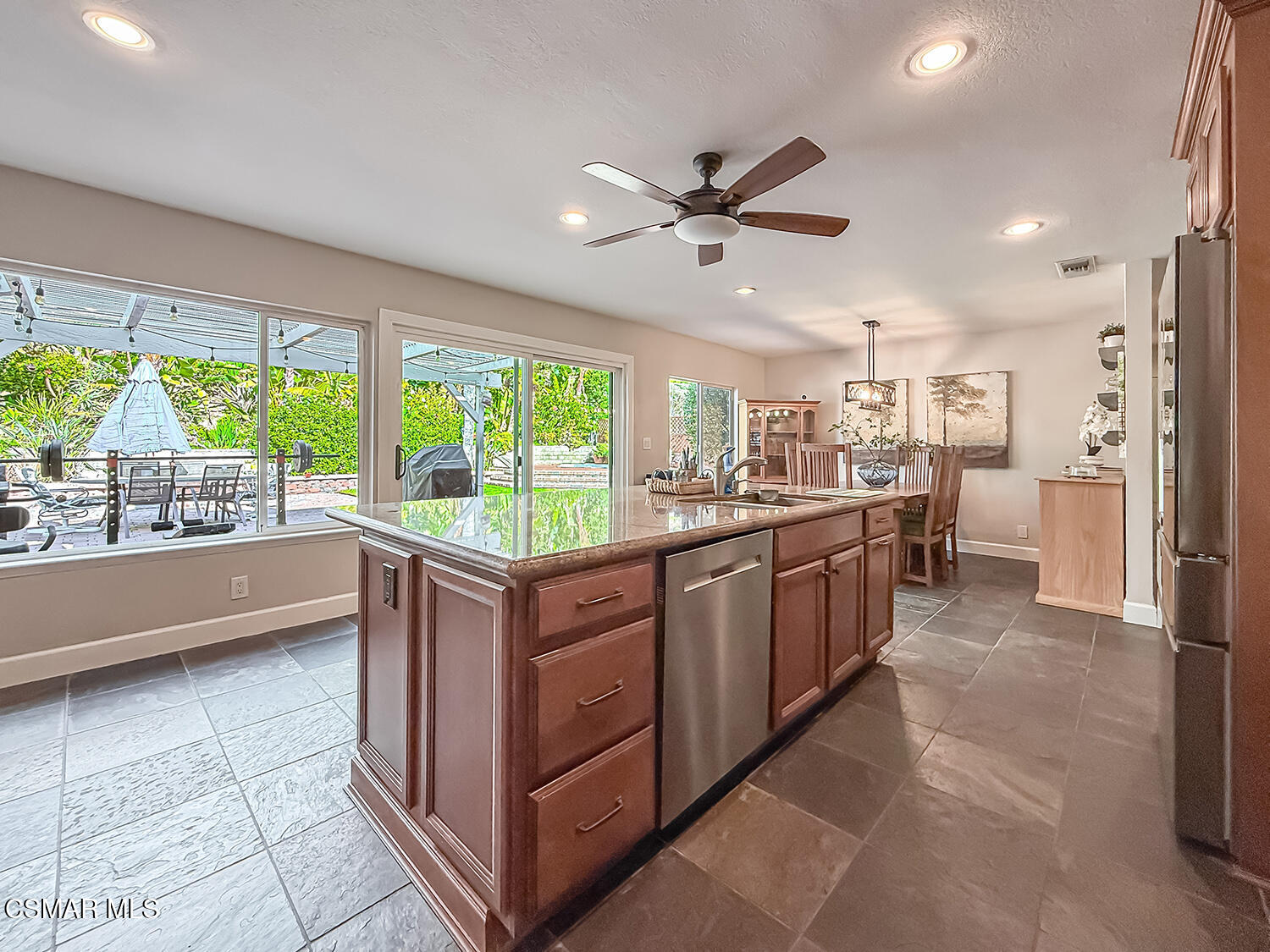 2189 Latham Street Simi Valley, CA 93065 - Photo 14 of 42 a kitchen with stainless steel appliances granite countertop a refrigerator a sink a stove and oven