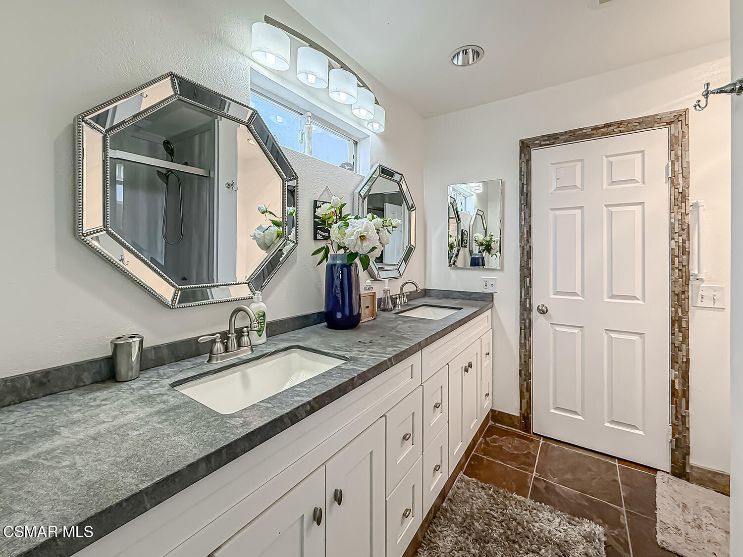 2189 Latham Street Simi Valley, CA 93065 - Photo 18 of 42 a bathroom with sink and mirror