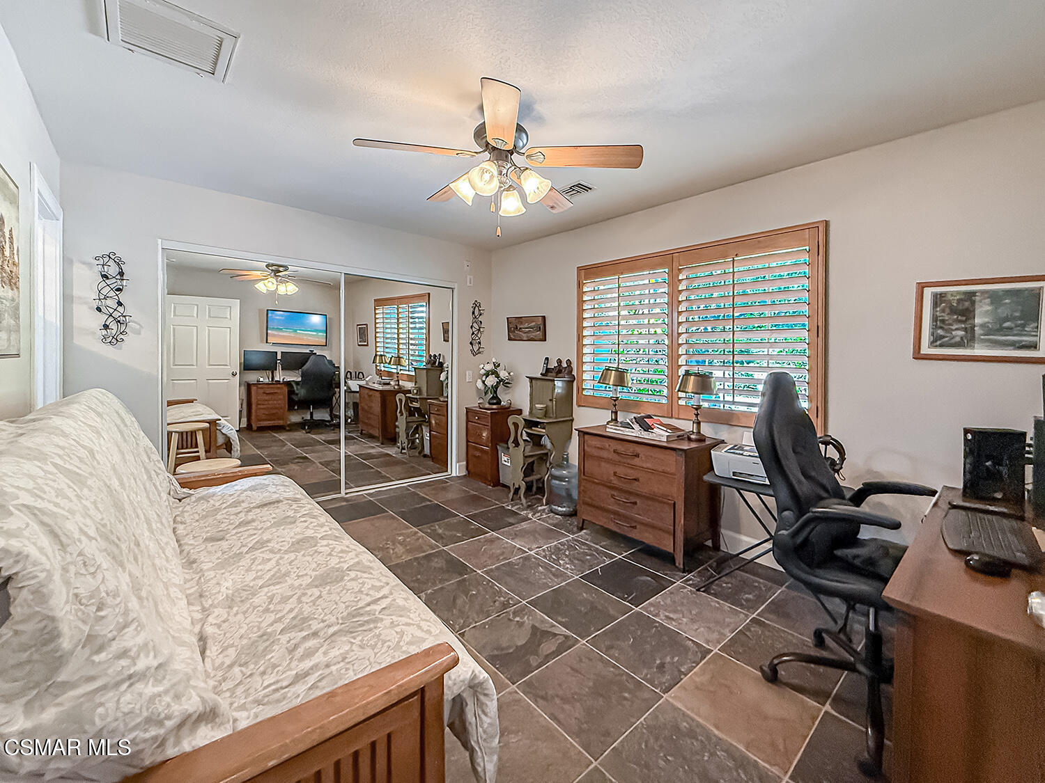 2189 Latham Street Simi Valley, CA 93065 - Photo 20 of 42 a living room with furniture and a flat screen tv