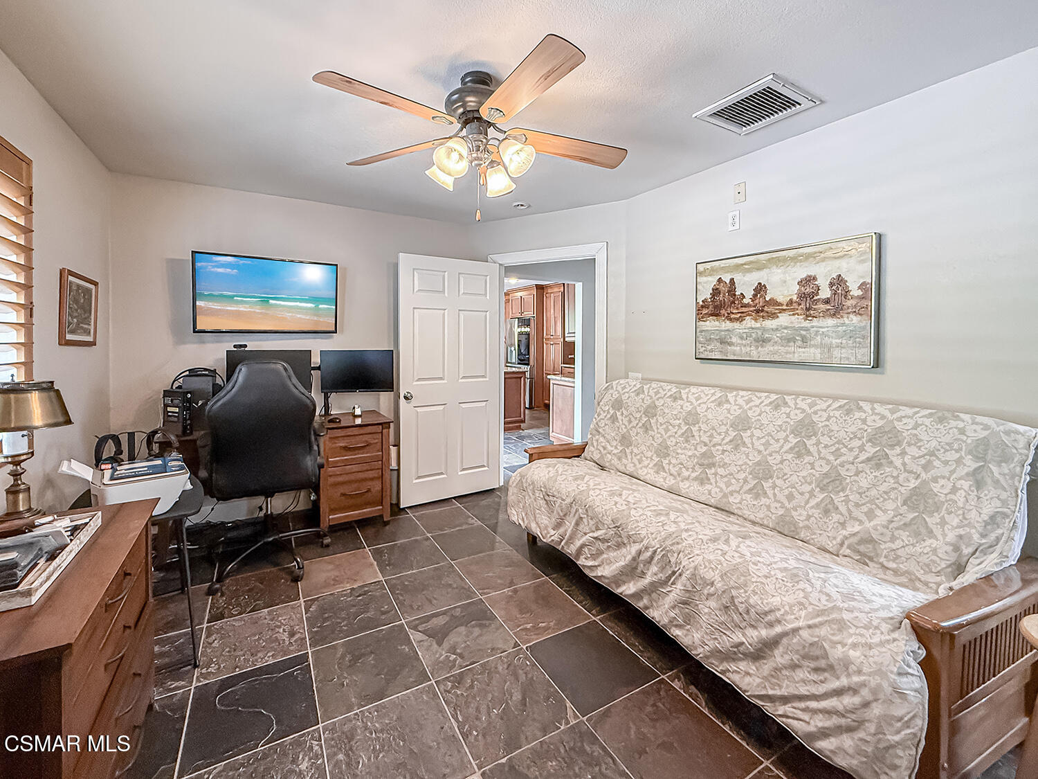 2189 Latham Street Simi Valley, CA 93065 - Photo 21 of 42 a living room with furniture and a flat screen tv
