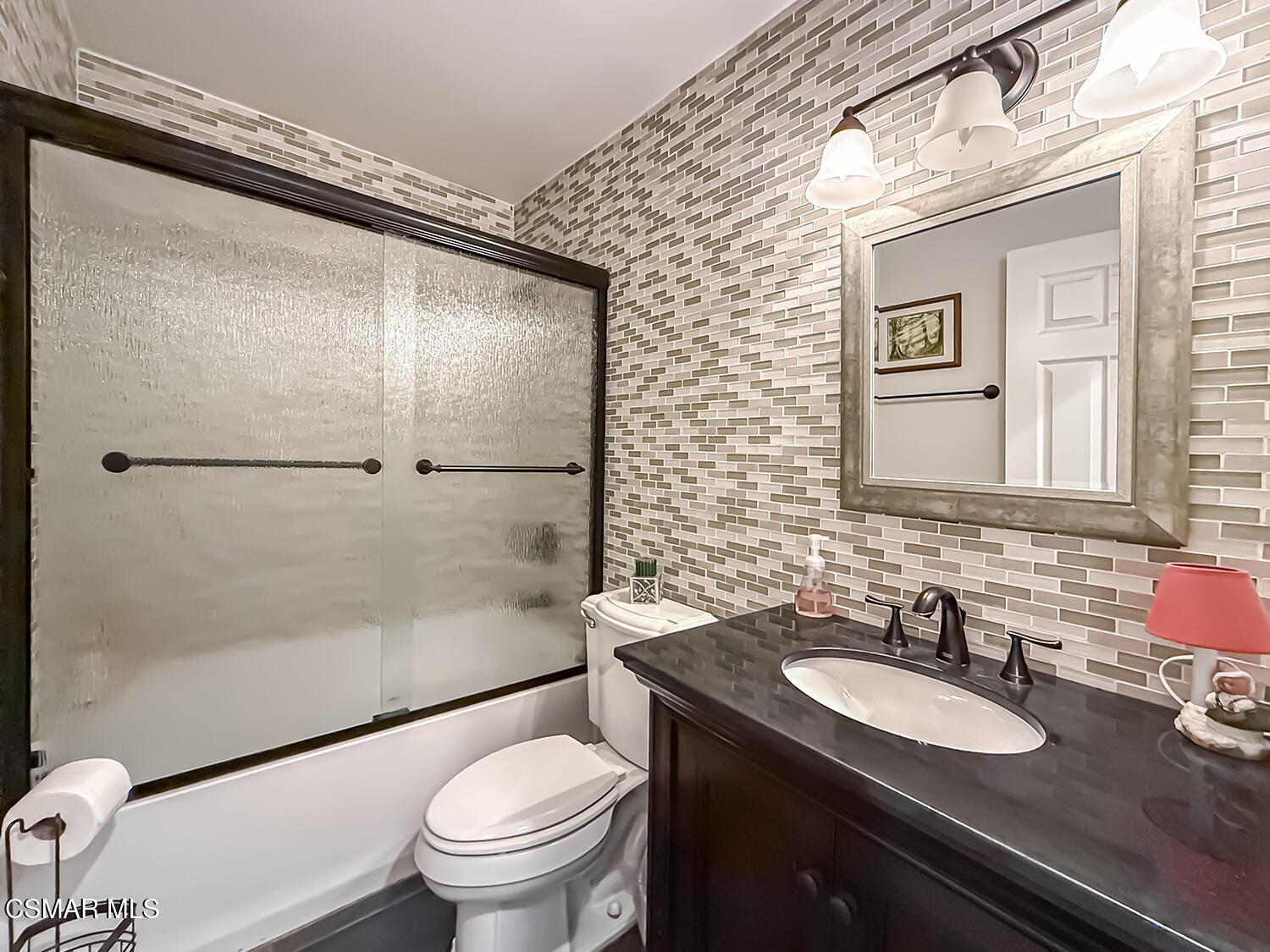2189 Latham Street Simi Valley, CA 93065 - Photo 23 of 42 a bathroom with a granite countertop sink toilet and shower