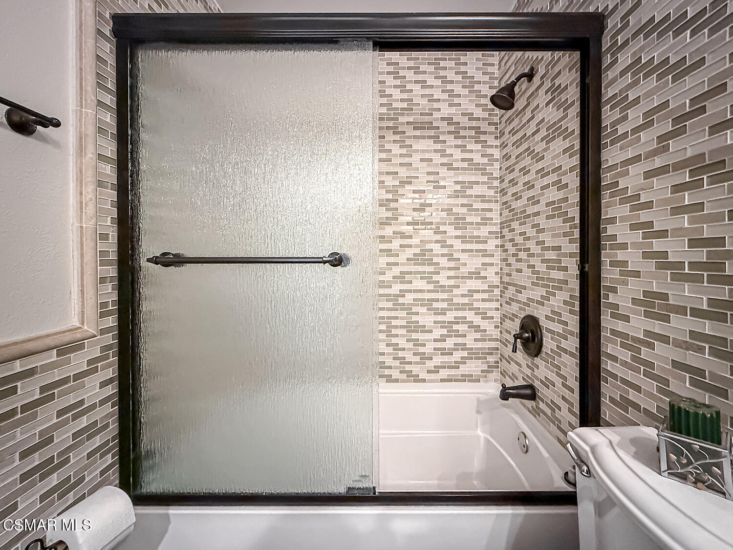 2189 Latham Street Simi Valley, CA 93065 - Photo 25 of 42 a bathroom with a bathtub and a shower