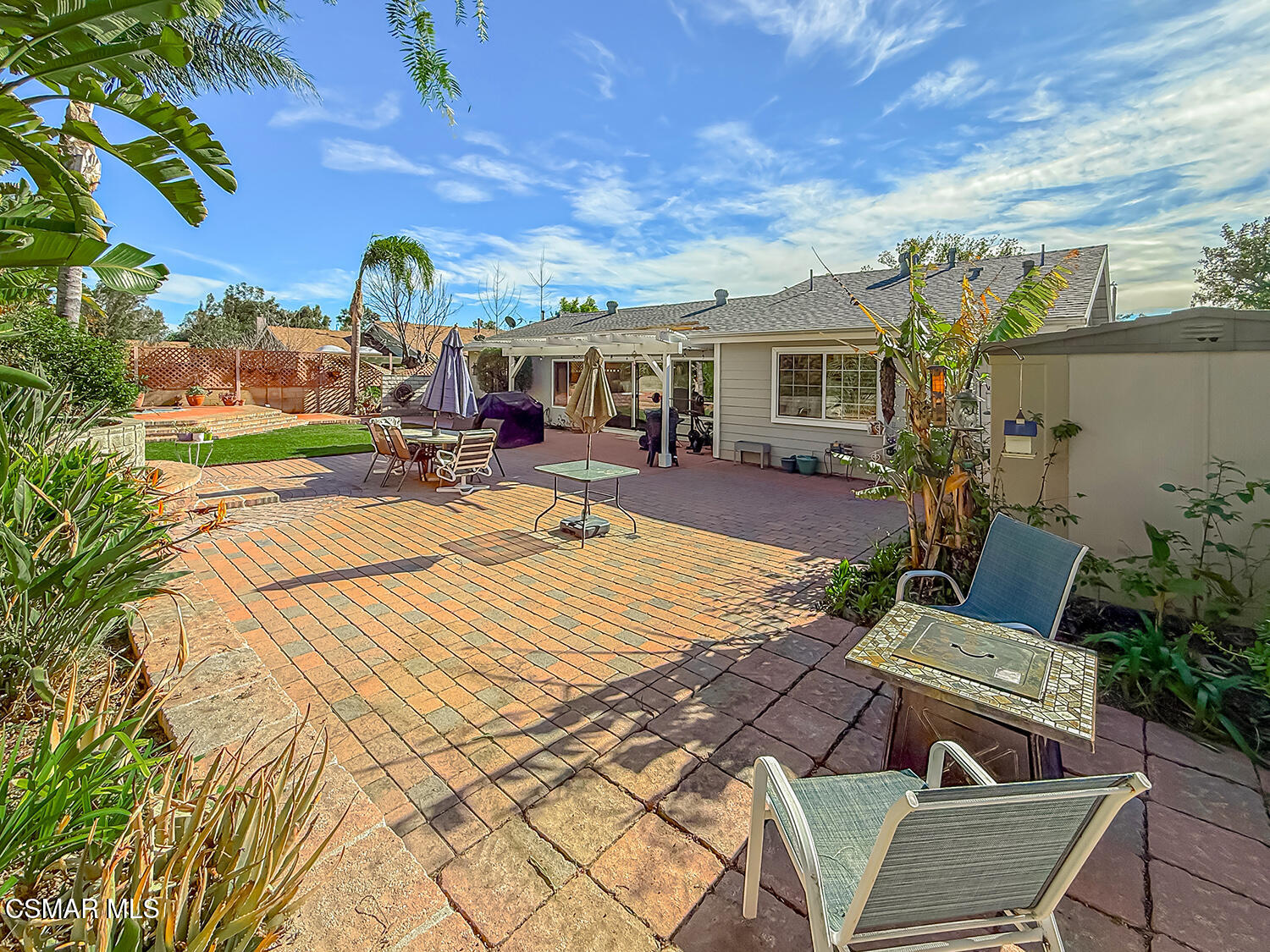 2189 Latham Street Simi Valley, CA 93065 - Photo 36 of 42 a view of a patio with couches table and chairs and potted plants