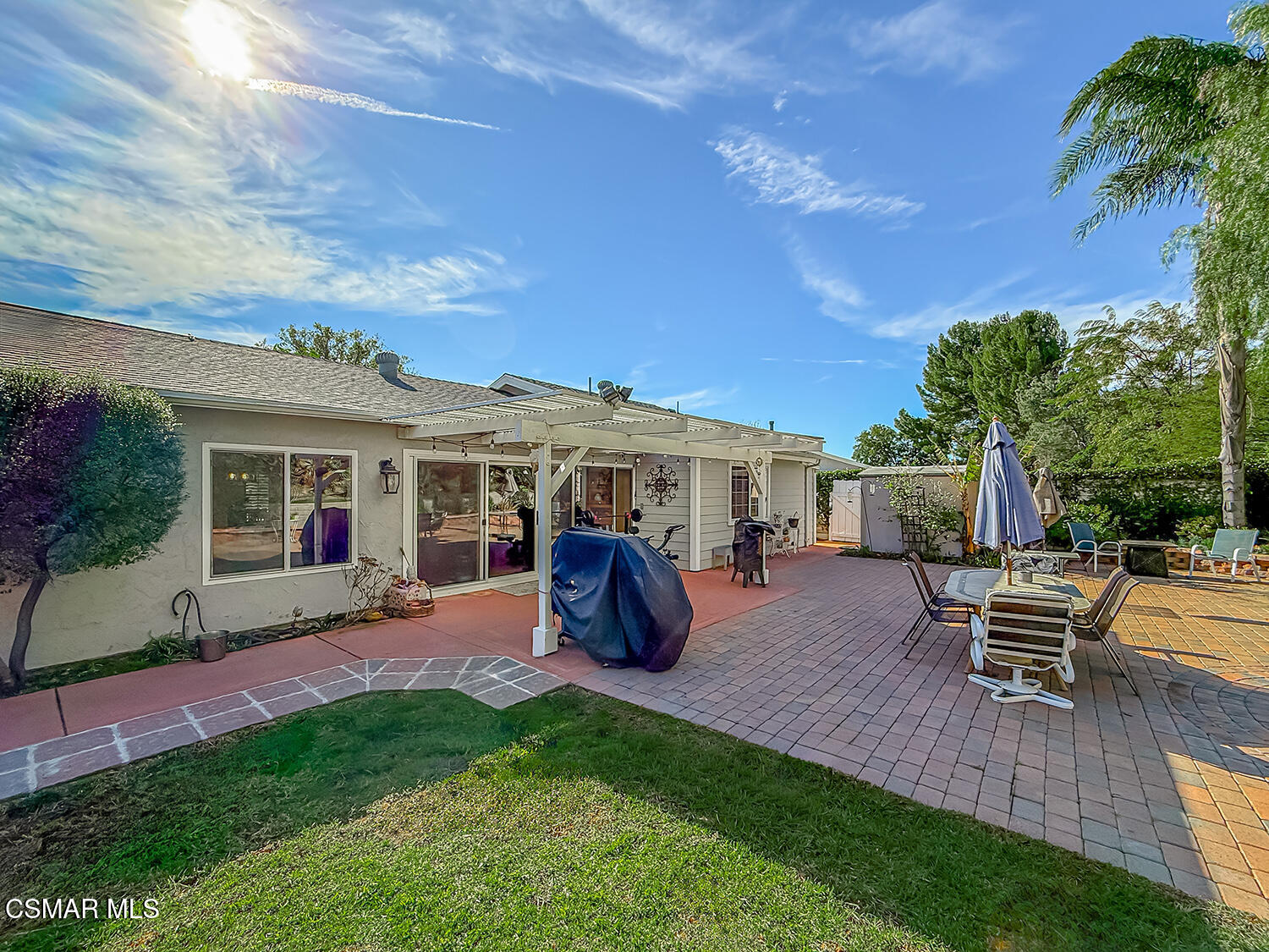 2189 Latham Street Simi Valley, CA 93065 - Photo 38 of 42 a view of a house with backyard sitting area and garden