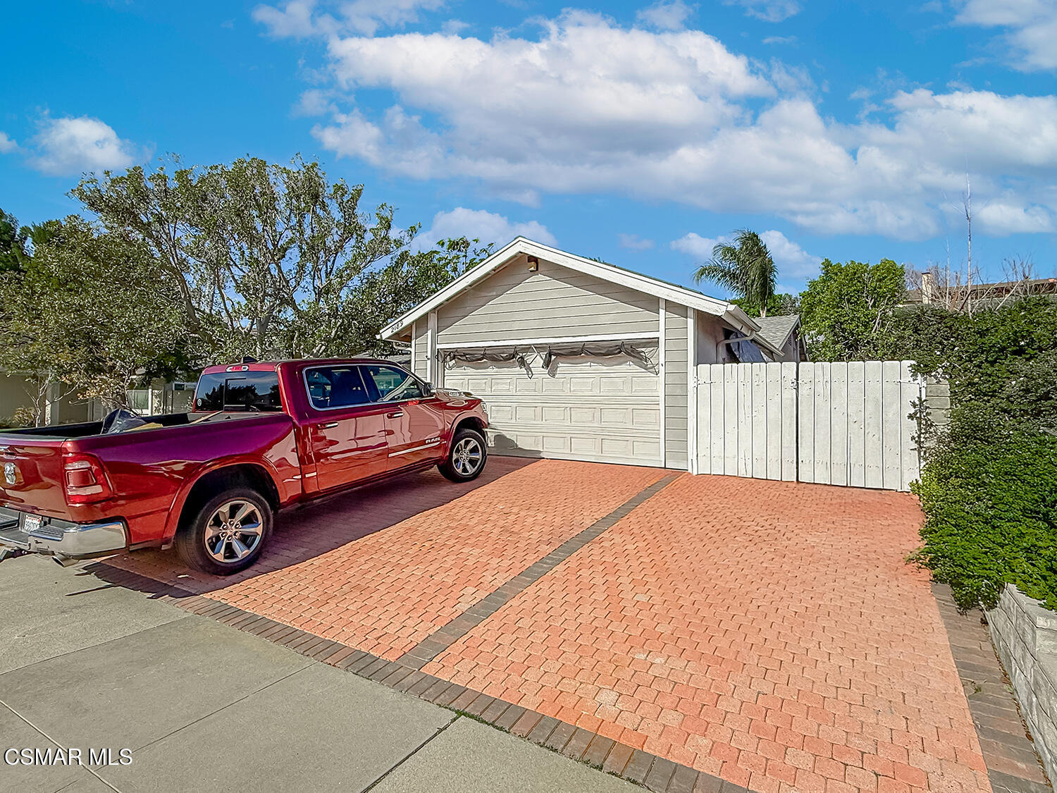 2189 Latham Street Simi Valley, CA 93065 - Photo 4 of 42 a blue car parked in front of a house