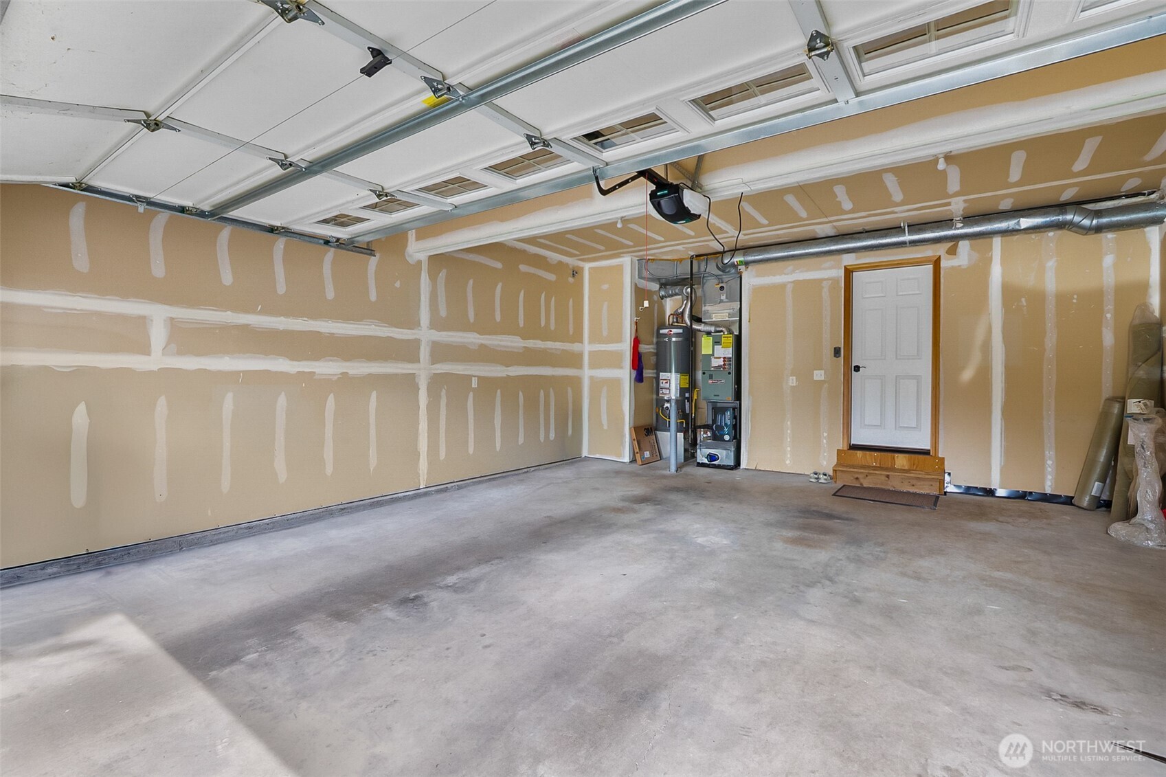 18410 11th Drive Southeast Bothell, WA 98012 - Photo 21 of 40 a view of empty room with wooden walls