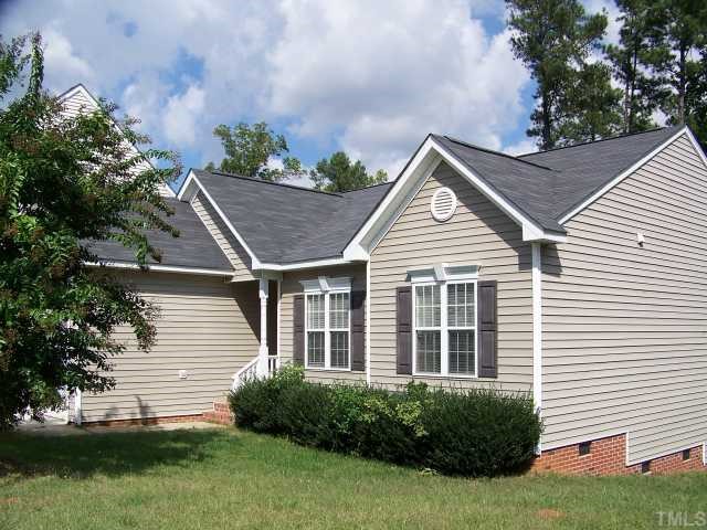 2517 Ferndown Court Raleigh, NC 27603 - Photo 2 of 10 a house that has a lot of plants in it