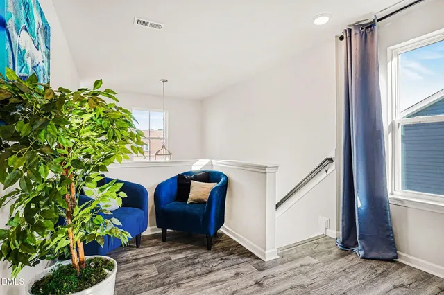 a bedroom with a bed and a table in it