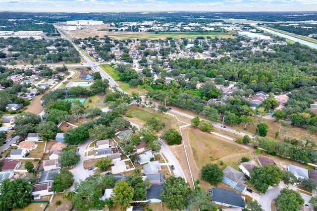 an aerial view of a city with lots of residential buildings