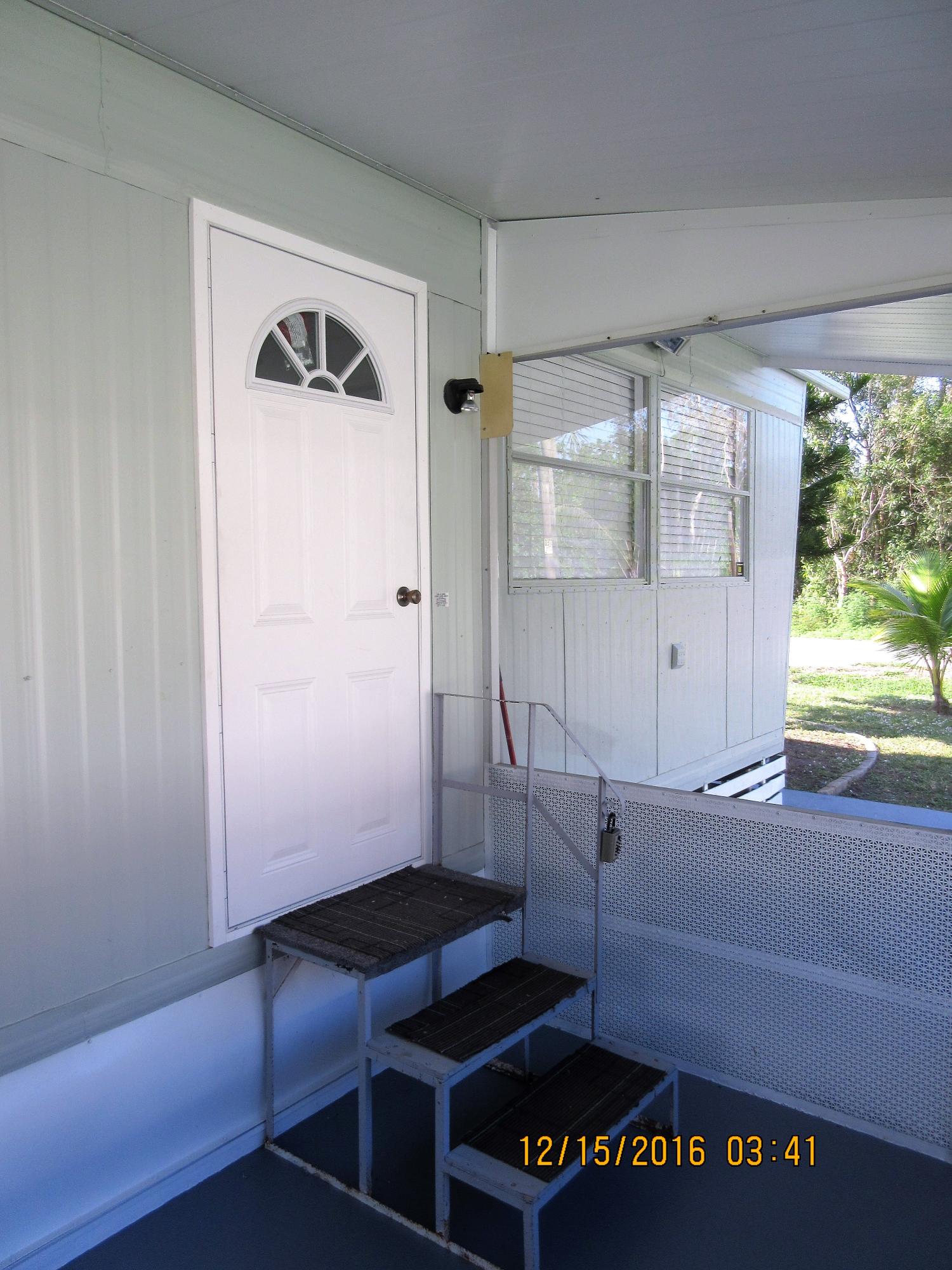 1734 Southwest College Street Stuart, FL 34997 - Photo 11 of 20 step to entrance