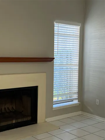 a living room with a fireplace