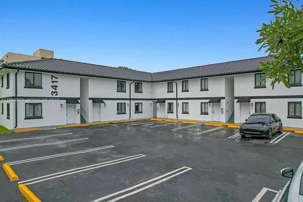 a car parked in front of a house