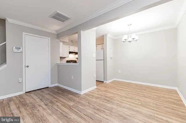 a view of a livingroom with wooden floor