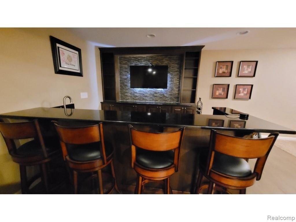 2036 Roundtree Rochester, MI 48307 - Photo 28 of 32 28-Basement Bar.jpg