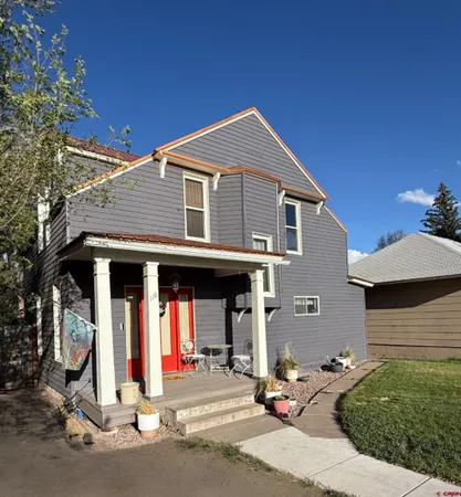 a front view of a house with a garage