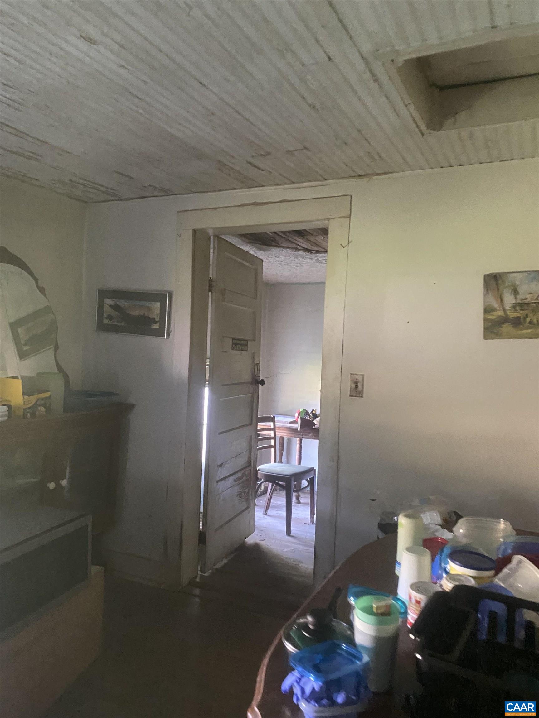 2744 Mansfield Road Louisa, VA 23093 - Photo 19 of 23 a bedroom with a bed and furniture