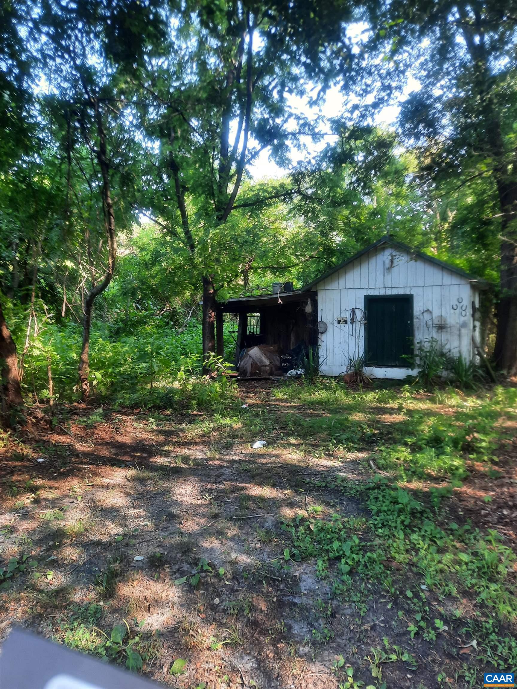 2744 Mansfield Road Louisa, VA 23093 - Photo 7 of 23 a view of a house with a yard