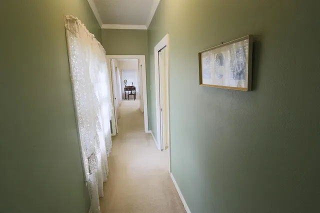 a view of a hallway with a elevator