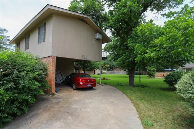 a view of garden with trees