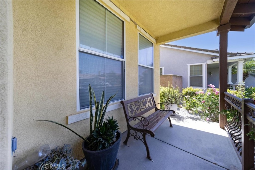 13449 Quail Run Road Eastvale, CA 92880 - Photo 12 of 59 a view of a chairs and table in the patio