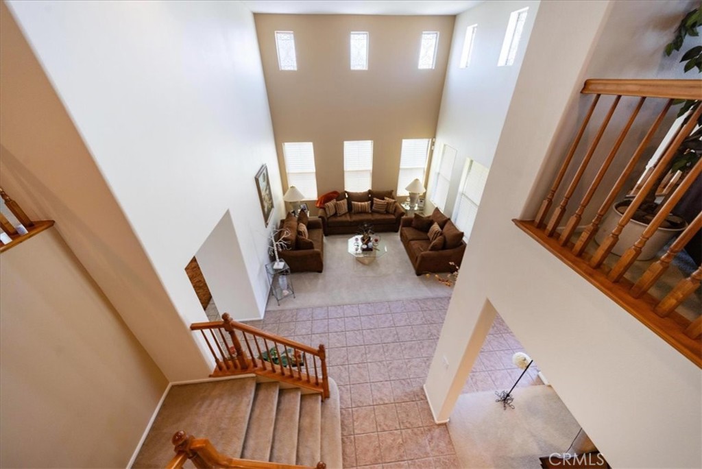 13449 Quail Run Road Eastvale, CA 92880 - Photo 37 of 59 a view of living room with furniture and windows