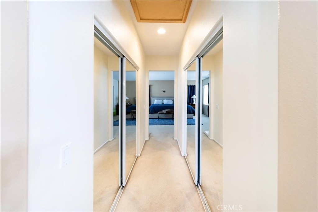 13449 Quail Run Road Eastvale, CA 92880 - Photo 49 of 59 dual closet in hall to master bath 1 is walkin