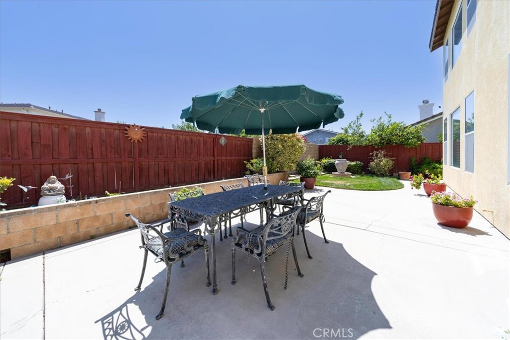 13449 Quail Run Road Eastvale, CA 92880 - Photo 54 of 59 a view of an outdoor sitting area with furniture