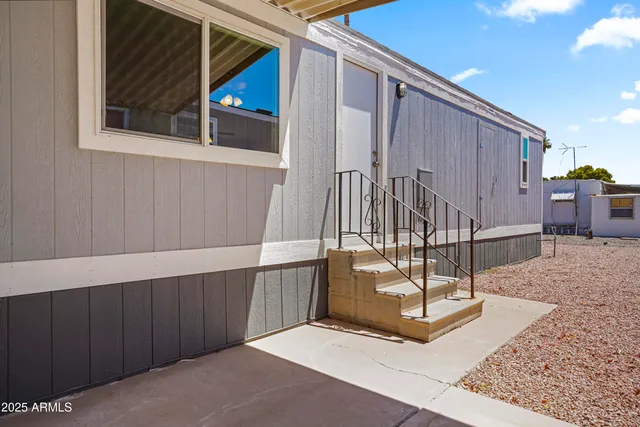 a view of a hall with wooden floor