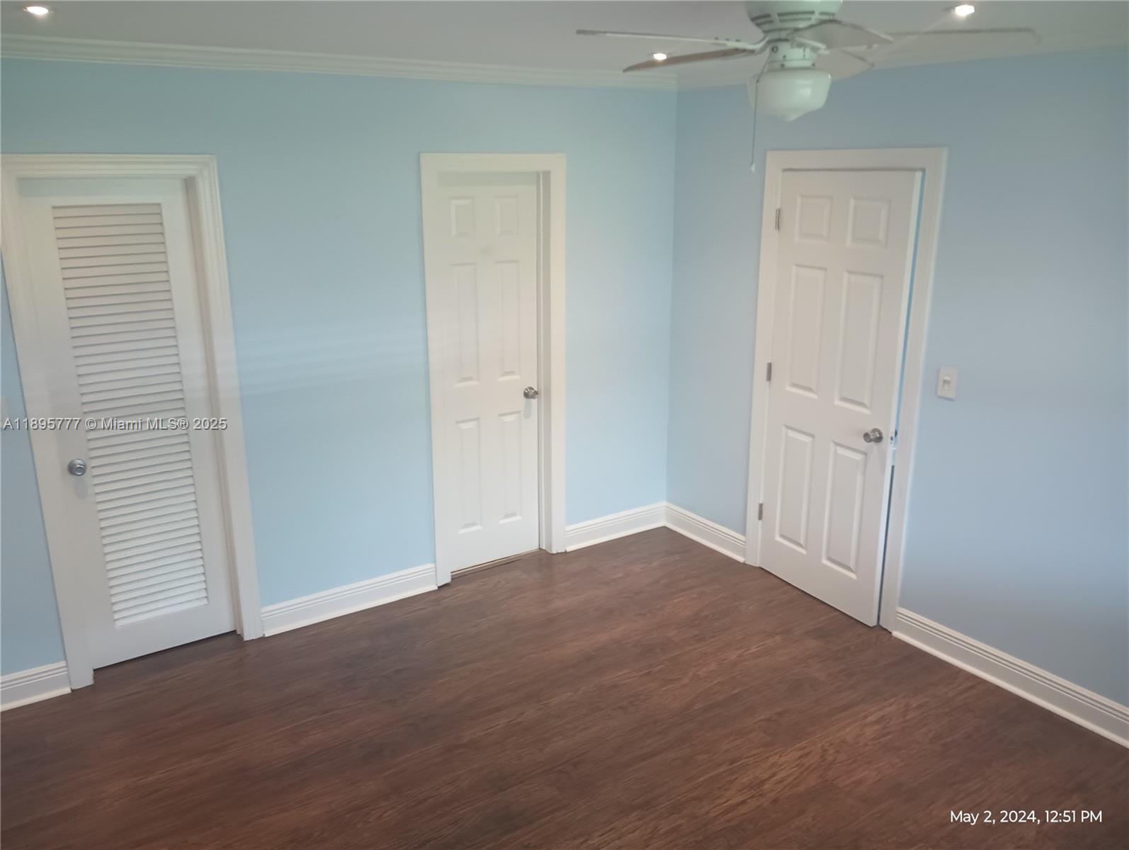 258 Neptune Avenue, Unit N Lauderdale-by-the-Sea, FL 33308 - Photo 8 of 14 wooden floor in an empty room